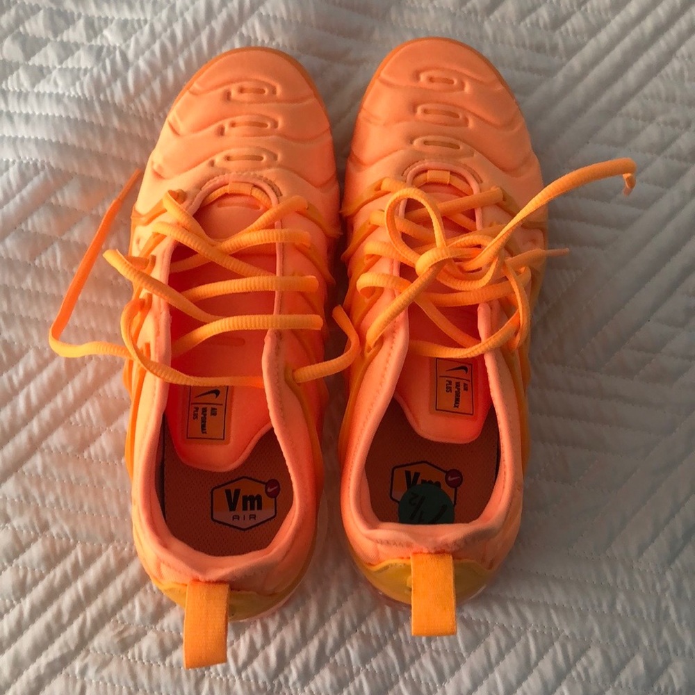 Bright orange Nike VaporMaxx in women or kids